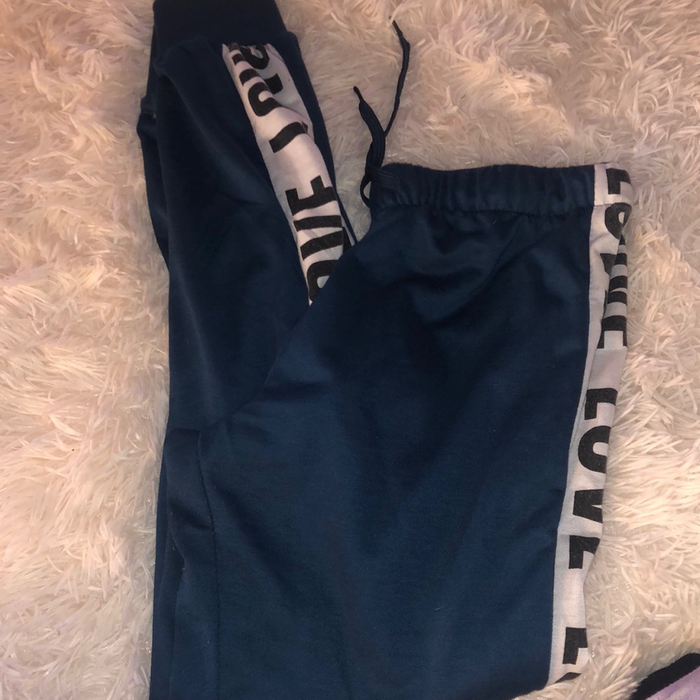 Green with love lettering down the side sweatpants